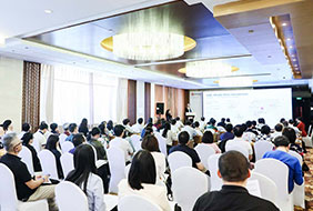 Big Conference room with customers in Beijing attending Onshorer's Seminar with a huge screen expo